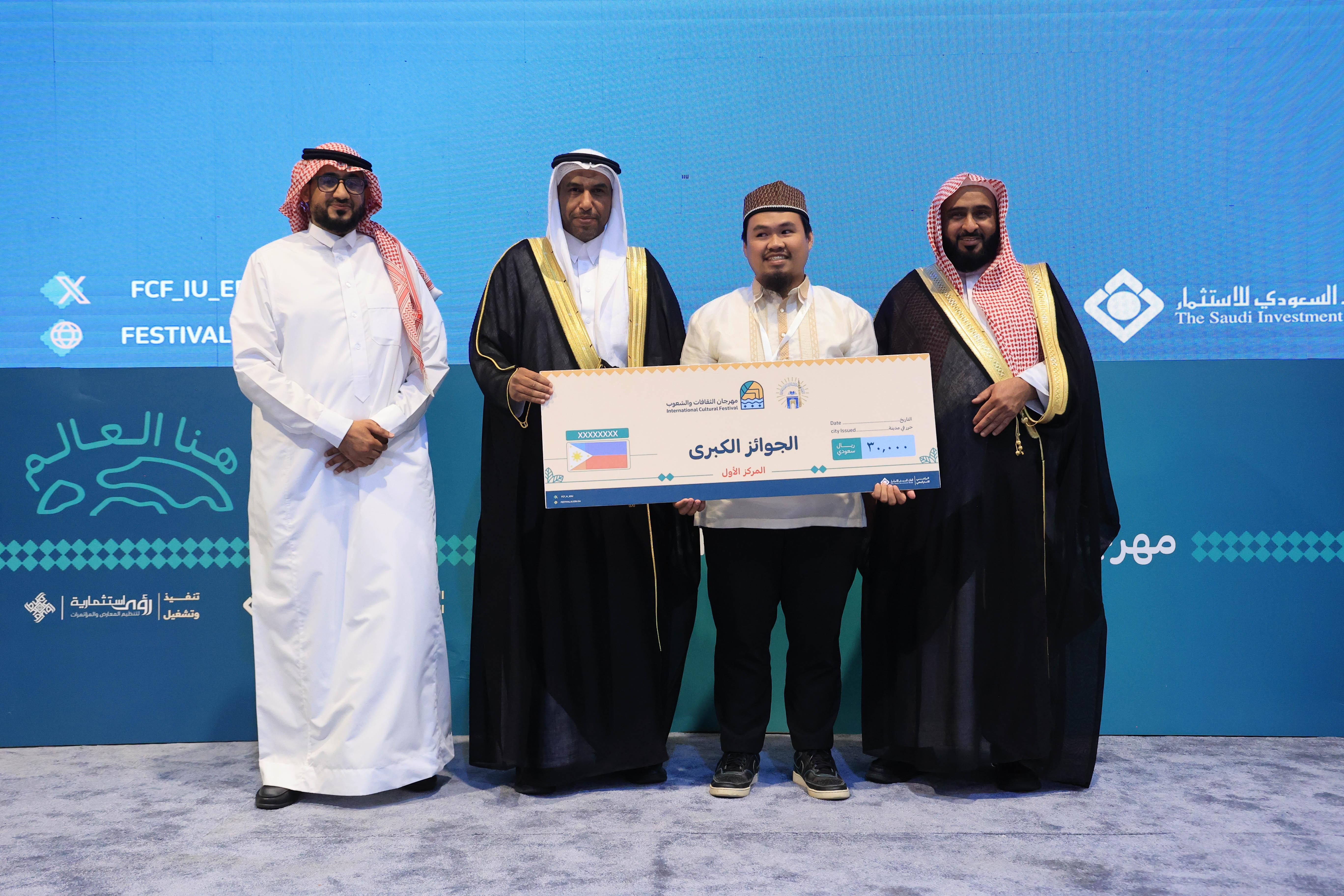 رعى سعادة رئيس الجامعة الإسلامية المكلف أ. د. حسن بن عبدالمنعم العوفي، الحفل الختامي لـ مهرجان الثقافات والشعوب الثاني عشر، - 17